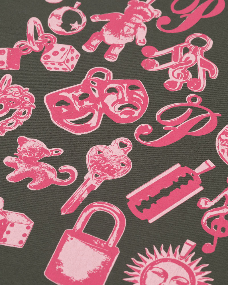 Close-up of the pink charms artwork printed on the Patta Kids Charm T-Shirt in Climbing Ivy.
