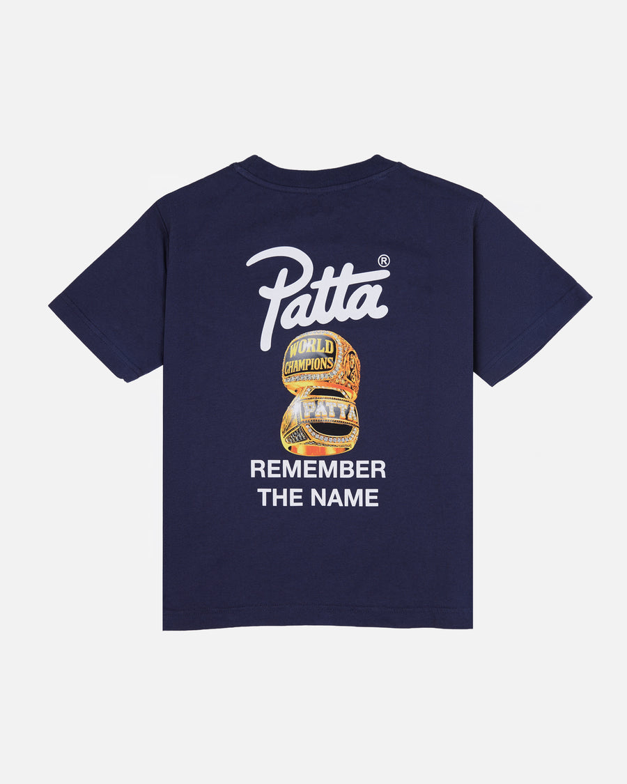 Back view of Patta Kids Championship T-Shirt in Black Iris navy with championship rings graphic.