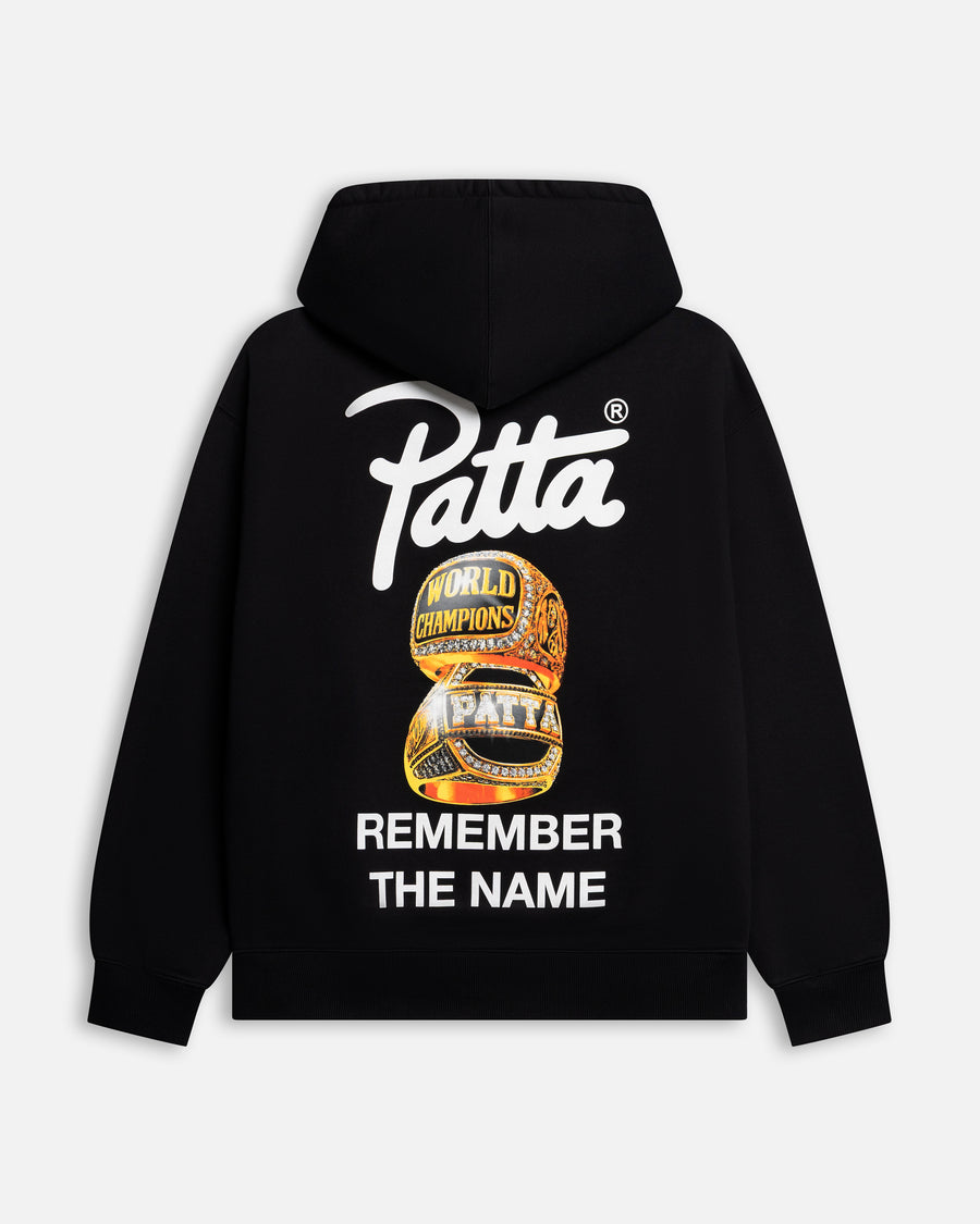 Back view of the black Patta Championship Hooded Sweater with gold championship ring graphics.